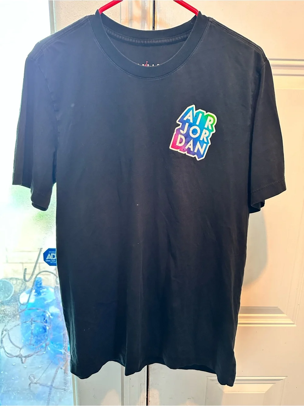 Jordan Black Tee with Multicolor Retro Badge Graphics